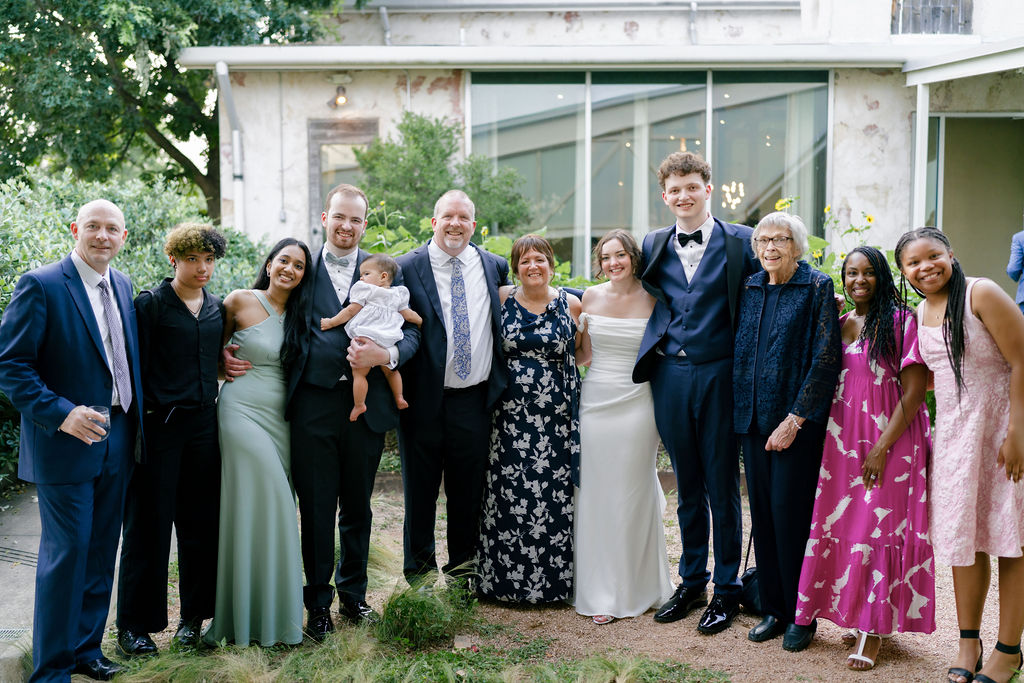 The bride and groom with some of their wedding guests